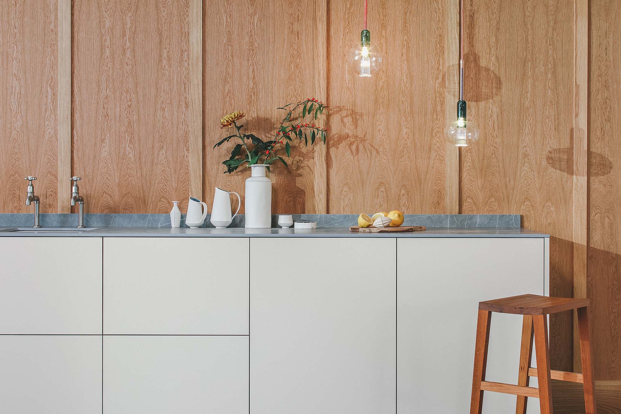 Husk's Avon Gorge Kitchen, featuring ply-edged FENIX kitchen fronts in Bianco Male.