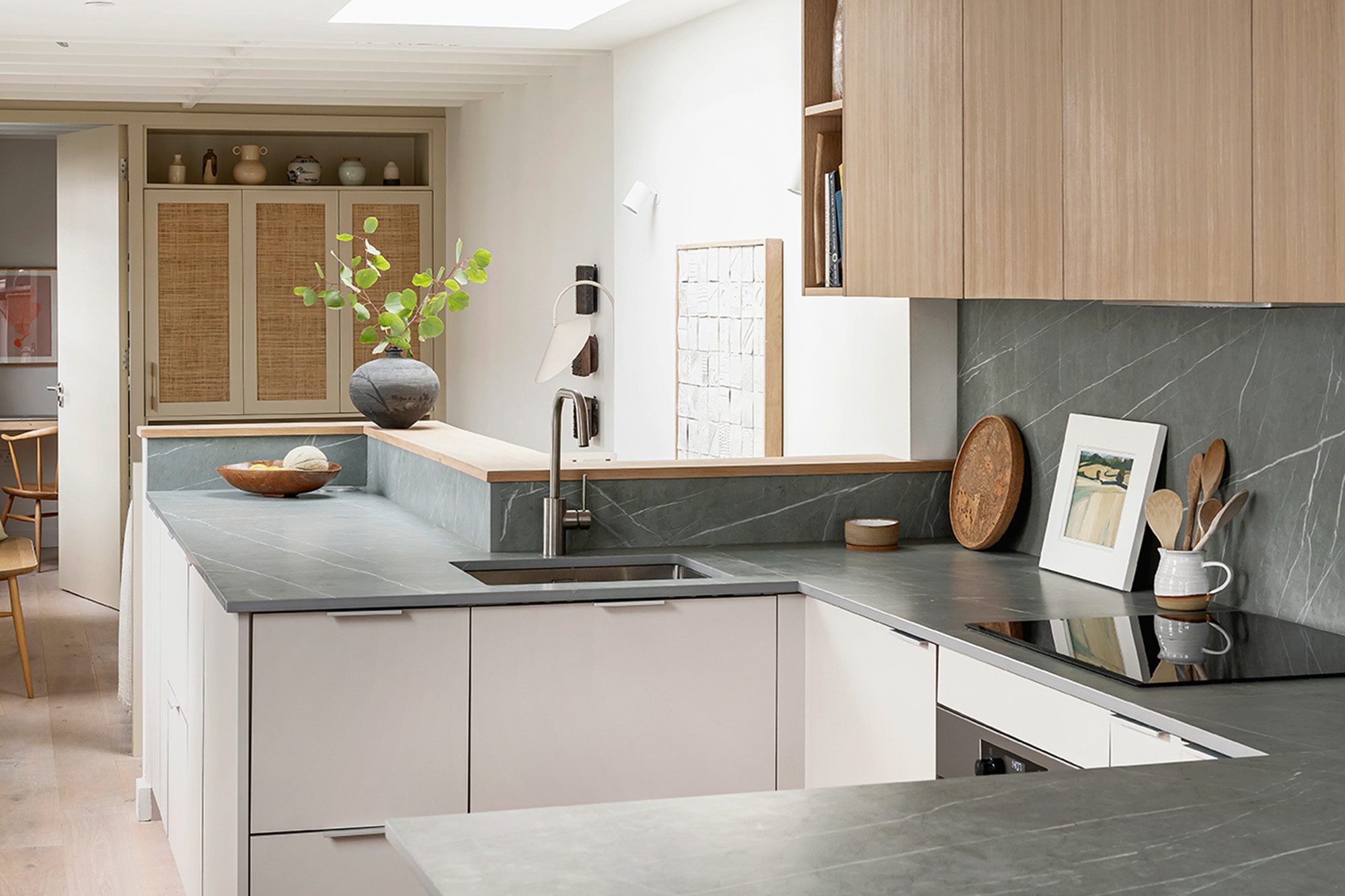 Husk's Old Pottery Kitchen, featuring Natura HPL Grigio Viola fronts and grey marble worktops.
