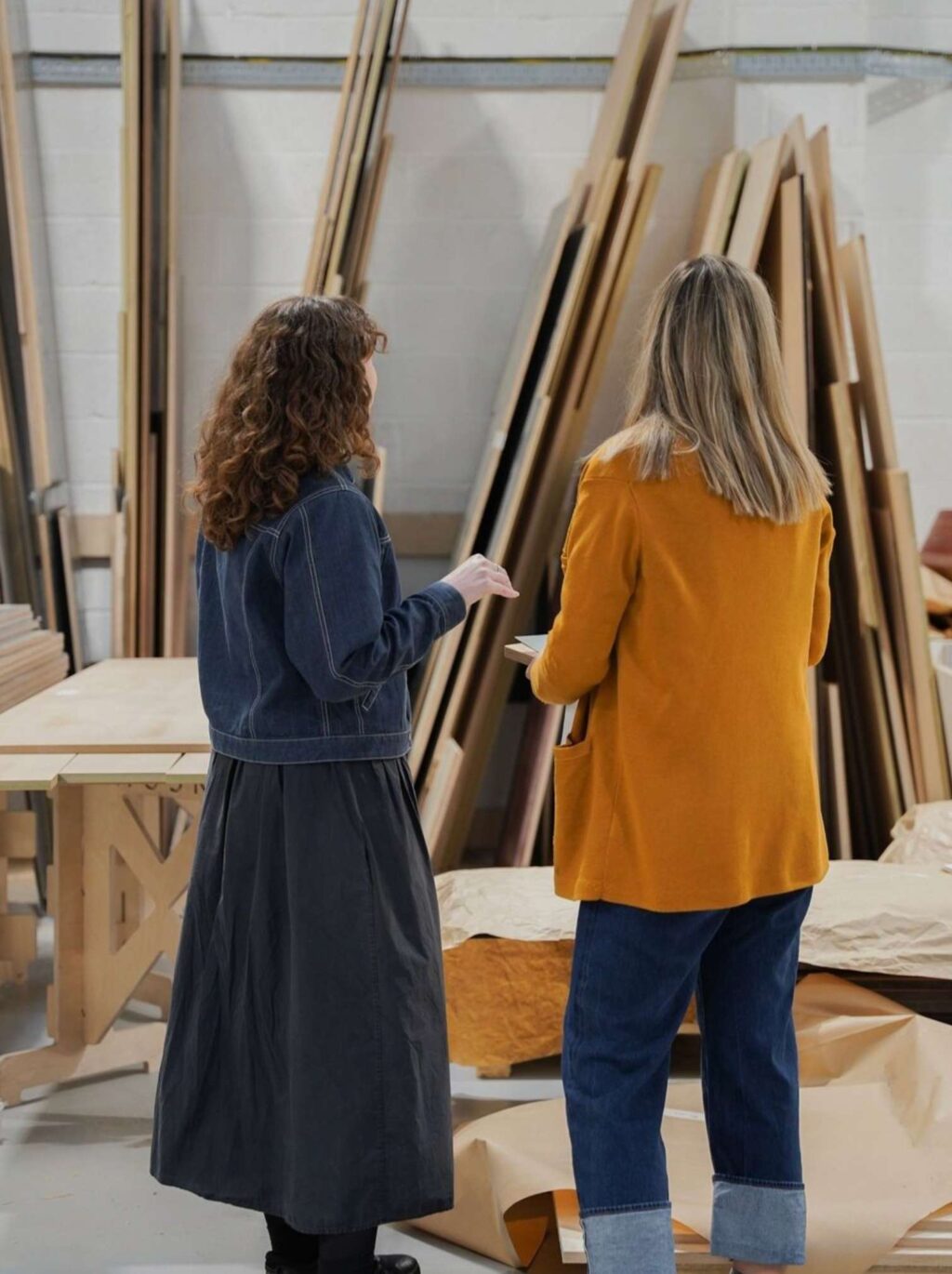 HUSK kitchen designer giving a customer a tour of the Bristol workshop