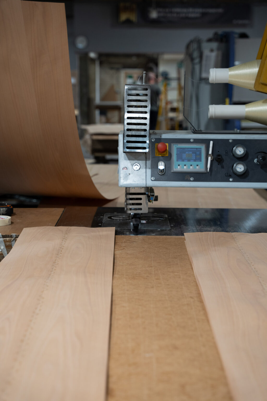 Stitching of timber veneer sheets